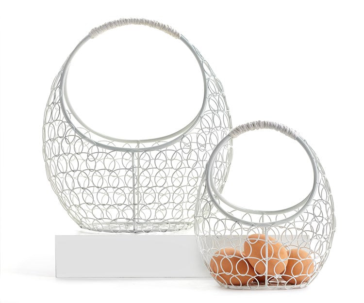 Add to the festive look of your home with this white wire basket set.  Styled with a comfort grip handles and oval design.  Use them to decorate for the season.  They will look lovely on your Easter table filled with colourful eggs or flowers. Perfect for using to gather all the treats from your egg hunt too!  Set Includes:  (1) Small - 6.5