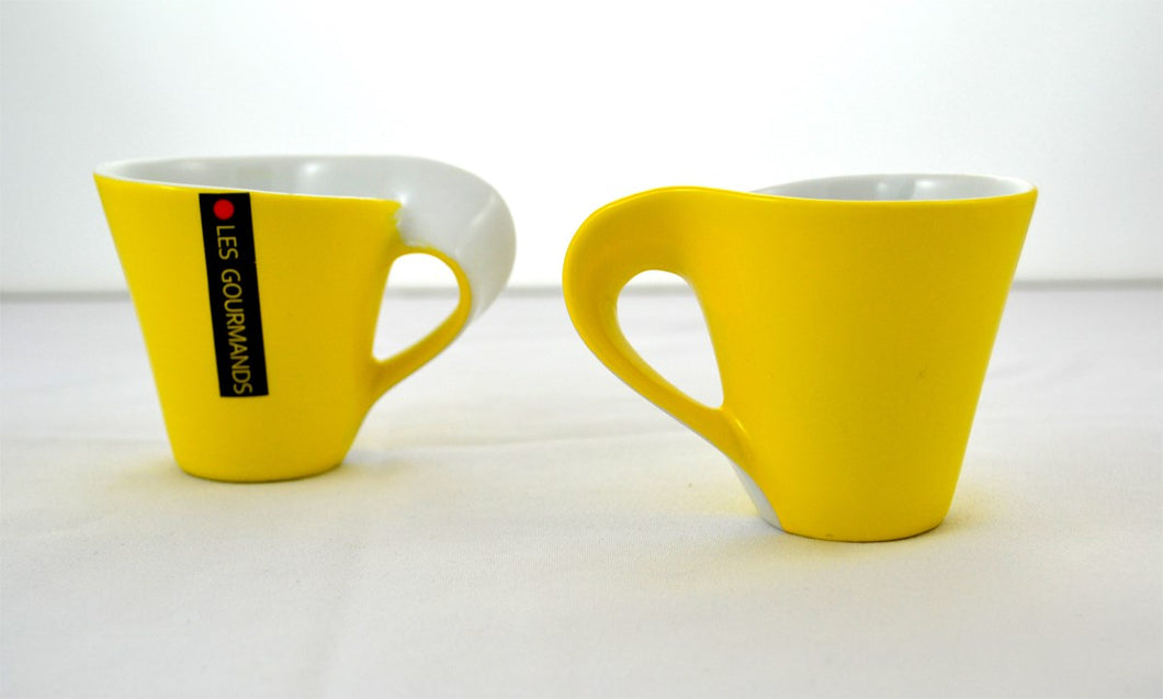 A sun burst of colour is what every kitchen needs.  Impress your guests.  These beautiful espresso cups will compliment any Espresso machine. Each Set Includes:  2 Yellow Ceramic Espresso Cups
