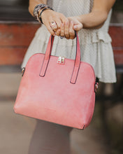 Load image into Gallery viewer, This gorgeous Lizard Pink Candice Handbag is a classic style, with an eyecatching colour. Beautiful and easy to carry and sits perfectly when placed down.  A stunning design makes this perfectly sized handbag a must have!  Features:  1 x Phone Pocket 1 Zip Pocket 1 Flat Pocket Internal lining: Black/White Stripe Lining Strap Height: 13cm Extension strap: 110cm Adjustable Detachable Closure: Secure Zip Material: Vegan Leather  Hardware: Light Gold  Dimensions: W28 x H24.5 x D11cm
