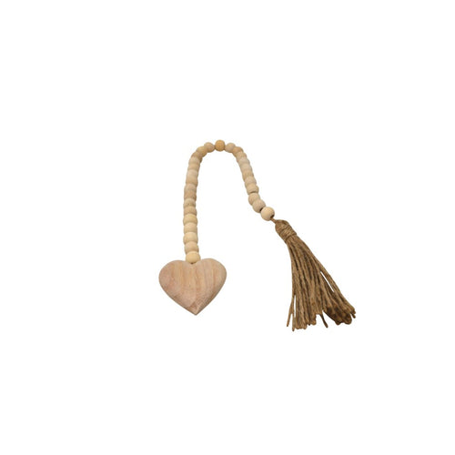 This natural wooden heart garland makes a beautiful addition to your home décor.  Trendy and fun, they can be placed anywhere.  Have it spilling onto your coffee table with one of our candles, or hang them from a book shelf or chair to show off the adorning tassle.  They are also a perfect gift for new babies, newlyweds or a wonderful hostess.    Dimensions: 5 X 1.5 X 46 CM