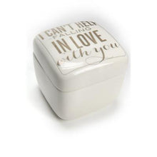 Load image into Gallery viewer, This one is a tribute to our parents and the love they shared.  This beautiful ceramic white and gold Trinket Box is inscribed with the famous Elvis Presley song &quot;I Can&#39;t Help Falling In Love With You&quot;,  which was one of our Mom&#39;s favourite songs, and one my dad either sang or played everyday for her.  We couldn&#39;t think of a better decor piece for other&#39;s to continue the same sentiment, to express their love and store their treasured jewellery or keepsakes in.   Size:  3.5&quot; x 3.5&quot; x 3.5&quot;  Material: Ceramic
