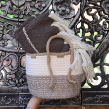 Load image into Gallery viewer, Small woven braided basket - 8&quot; diameter. Shown with wool blanket inside
