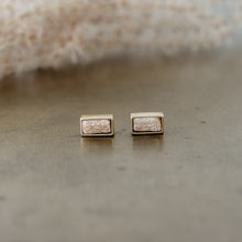 Load image into Gallery viewer, These simple studs draw attention with its drop of sunlight sparkle.  They have a small and delicate presence, and will shine with any of your outfits for any occasion.  Details:  Druzy quartz studs Disc backing Hypoallergenic Nickel/ lead free 3 coats anti tarnish. Shown: Champagne
