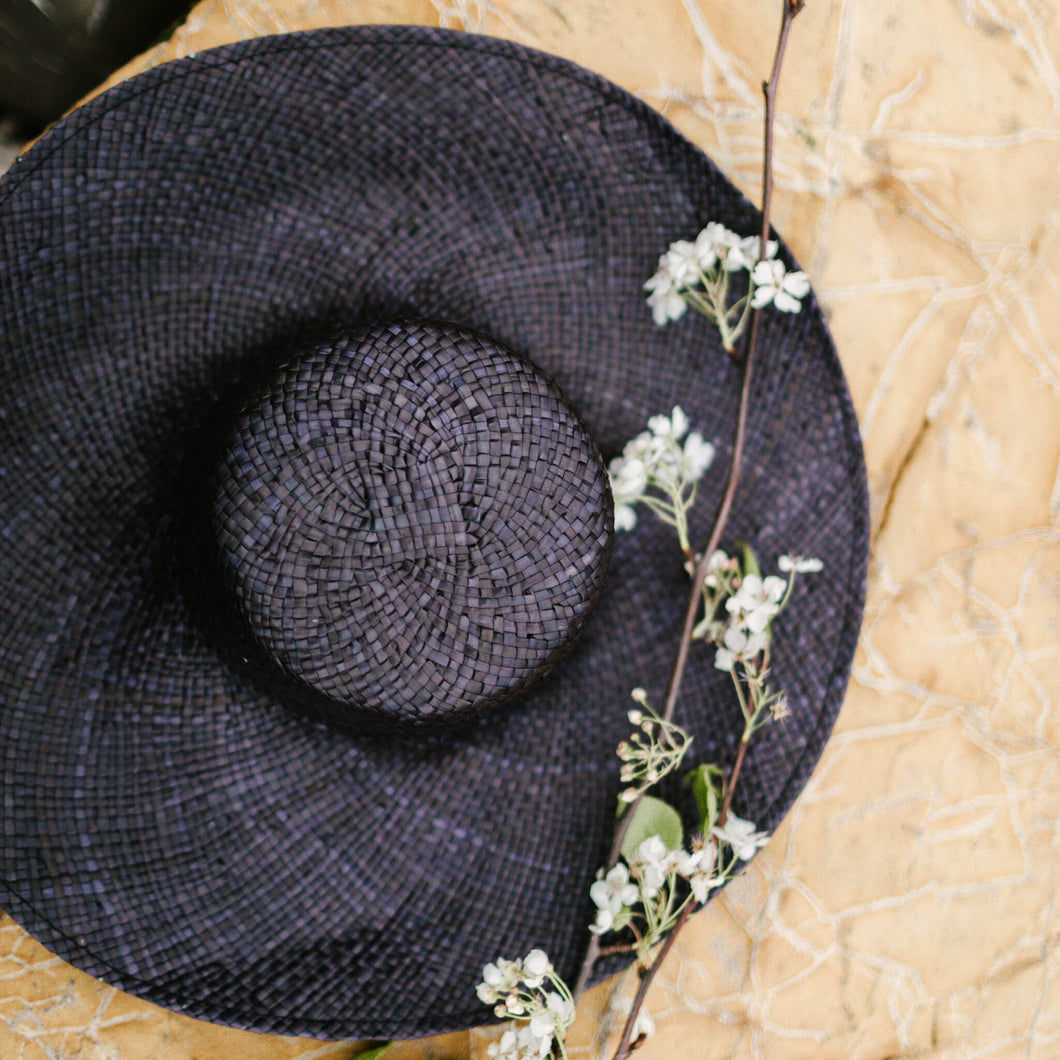 Hat is handmade by skilled Indonesian artisans. This Beach Hat is wide-brimmed, floppy, breathable and lightweight. It will keep its shape while being bendable to your preferred style, and easy to care for. You can add colour to your hat by adding a sash, or a lightweight scarf above the brim. Very versatile. One-size-fits-many. Pair it with our beach bags and pareo for the cottage or beach. Size: 21