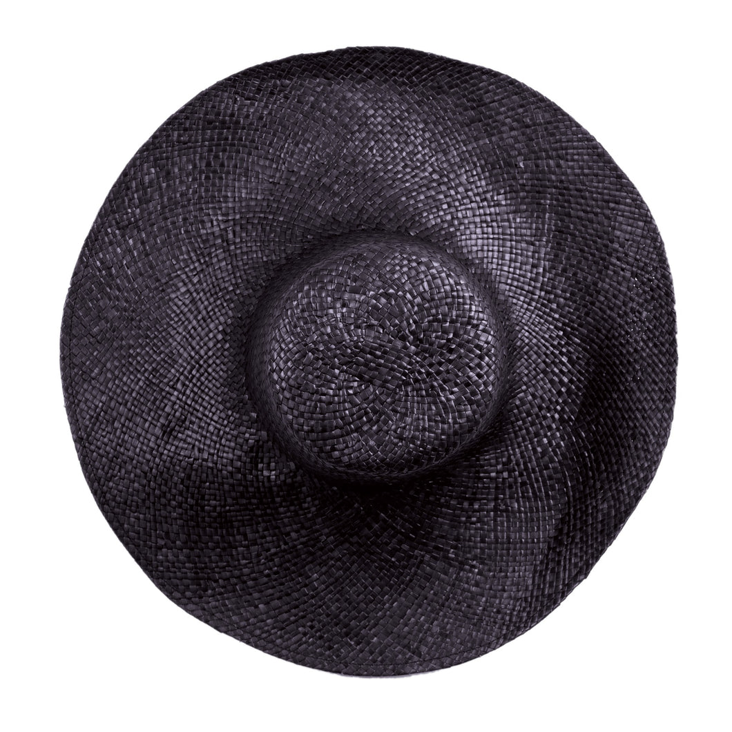 Hat is handmade by skilled Indonesian artisans. This Beach Hat is wide-brimmed, floppy, breathable and lightweight. It will keep its shape while being bendable to your preferred style, and easy to care for. You can add colour to your hat by adding a sash, or a lightweight scarf above the brim.  Very versatile.  One-size-fits-many.  Pair it with our beach bags and pareo for the cottage or beach.  Size:  21