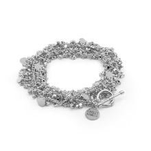 Load image into Gallery viewer, The Maya Silver Wrap Bracelet/Necklace brings the party right to you. This piece allows you to wear your piece as a wrapped bracelet or a layered necklace, making this a wonderful piece to add versatility to your collection. We know you will love the Maya Wrap, exclusively from Kinsley Armelle.  Details:  Silver Ion Plated Stainless Steel 5 - 8.5 Inches Circumference / 56 Inches Length. Shown as a bracelet
