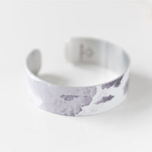 Load image into Gallery viewer, We have picked some of our favourite pieces and paired them with an inspirational saying that resonates with us. Quote inside:  &quot;Life is a story. Write well. Edit often.&quot;  Made of aluminum each cuff is hypo-allergenic, lead and nickel free, with no toxic finishes. Everything is printed with a permanent dye which gives a nice vibrant finish.   Cuffs are super light weight and adjustable allowing them to be molded to fit most sizes.   Each cuff is 3/4&quot; thick
