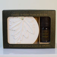 Load image into Gallery viewer, These Ceramic Diffuser &amp; Essential Oil Gift Sets provide a portable touch of beauty; wherever, whenever. The ceramic diffuser porous stone features an elegant nature inspired design and quickly absorbs, retains and gently emits a concentrated blend of diffusing oil. Gift Boxed.  3 Scents to choose from:  Lavender Fields Sandalwood Jasmine Lyrical Angelica Perfect to hang in your car, closets, powder rooms or any small spaces around your home.  Shown:  Sandalwood Jasmine
