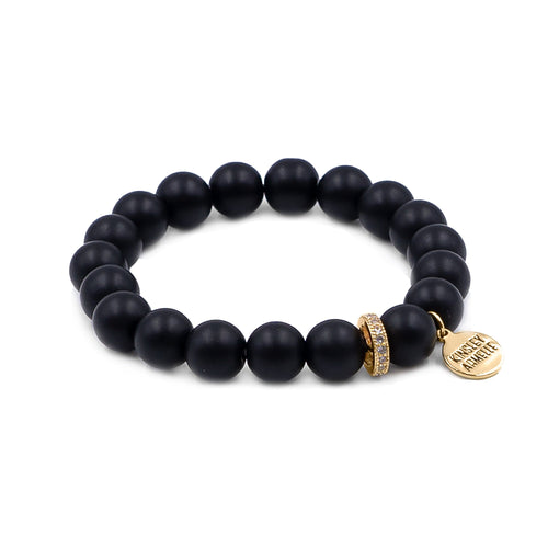 The Coal Eternity Beaded Bracelet is simplicity at it's finest. Contemporary druzy rhinestone subtly accents the black stone beads. Soft, elegant features are neutral enough that make these bracelets perfect for any and all occasions.  Exclusively from Kinsley Armelle.   Details:  Style: Beaded Material: Black Obsidian Size: 6.5 - 7 Inch Circumference