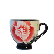 Load image into Gallery viewer, Pretty-up your table with these beautiful Hand Painted Espresso cups.  Its bold floral pattern are the perfect compliment to any Espresso beverage.  Make it a complete set with our bold red Espresso Machine.  Perfect as a Birthday, Hostess, Bridal Shower, or Just Because.  Each Set Includes:  2 Floral Ceramic Espresso Cups
