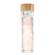 Load image into Gallery viewer, Take tea time anywhere with this chic portable infusing glass bottle. This double-walled 16 oz. botte keeps drinks at the perfect temperature while staying cool to the touch.  It includes a detachable strainer and infuser for loose-leaf tea.  Material:  Double-walled borosilicate glass, stainless steel, bamboo, &amp; silicone Capacity: Holds 16 oz Care: Handwash only   Includes: Detachable infuser Infuse tea on-the-go Exterior wall stays cool to the touch and keeps contents hot or cold longer
