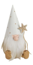 Load image into Gallery viewer, These guy can create magic!  Make your holiday decor sparkle and shine with these adorable gold and white metal vintage style santa gnomes.  2 Styles to choose from:  Star Santa Tree Santa Makes a great Teacher, hostess, or stocking stuffer gift.  Size:  4 × 3.5 × 7&quot; each.  Shown:  Star Santa Gnome
