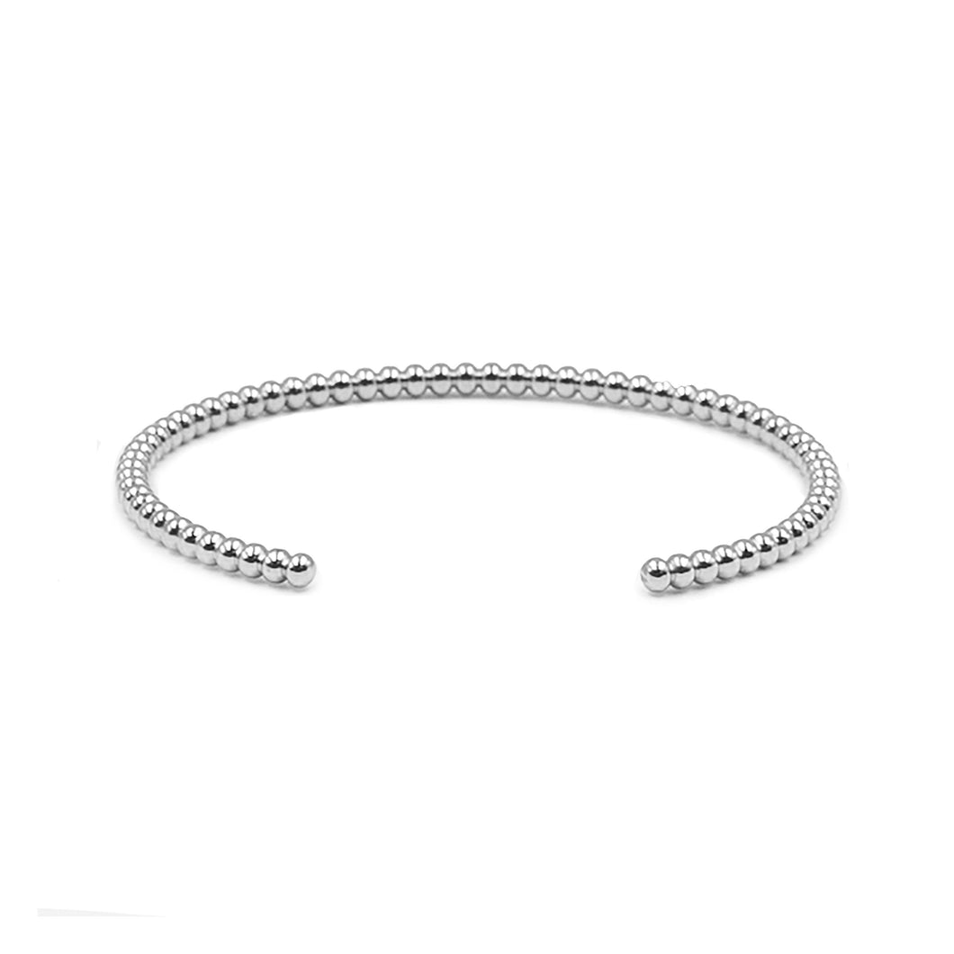 Cleo Goddess Metal Cuff Bracelet has an understated design that is both simple yet elegant. This exquisite piece looks amazing when worn on its own or as part of the gorgeous Lainey Stack , Exclusively from Kinsley Armelle.  Details:  Style: Cuff Material: Silver Ion Plated Stainless Steel Size: 6.5 - 8 Inch Circumference
