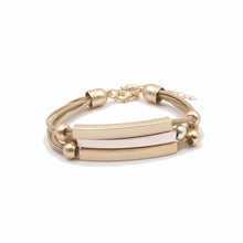Load image into Gallery viewer, The Hybird Metallic Bracelet with its adjustable clasp includes metallic bars of different shades. The bracelet provide a light weight option to mix and match and create a gorgeous tonal effect. The Hybird bracelet is elegant and fun on its own, but it also goes perfectly as part of the Lennox Stack.  Exclusively from Kinsley Armelle.  Details:  Style: Metal Bars Material: Metal, Leather Size: One size fits most
