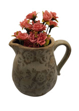 Load image into Gallery viewer, We can&#39;t get enough of this Shabby Chic Floral Imprinted Ceramic Pitcher. The contrast of both colour and texture adds instant vintage style, character and charm to any living space.  Perfect for your favourite flowers, or just as a decorative piece on your kitchen counter.    Dimensions: 6.25&quot; x 5.25&quot; x 6.00&quot;. Shown: Vase with flowers
