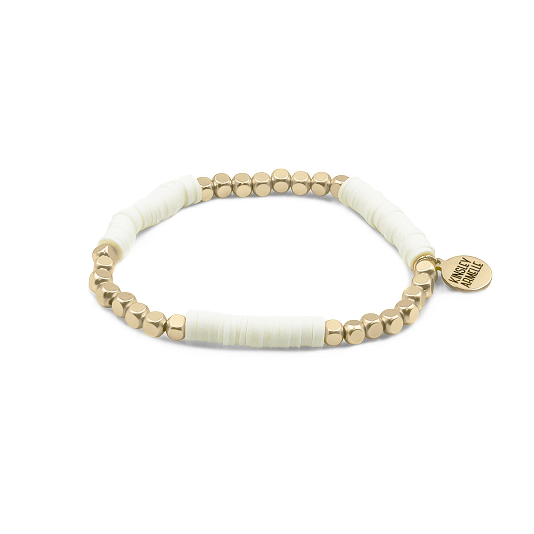 The Ashen Livia Beaded Bracelet offers a fun twist on a traditional design. Soft, elegant features are neutral enough that make the bracelets perfect for any and all occasions. It is stunning enough to be worn alone, but it also makes an excellent complement to the Lennox Stack.  Exclusively from Kinsley Armelle.  Details:  Style: Beaded Material: Clay and Metal Size: 6.5 - 8 Inch Circumference