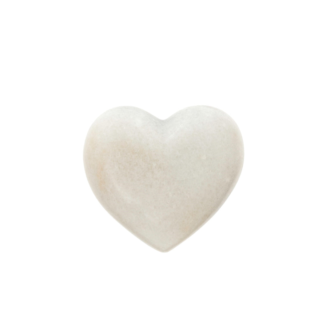 This hand carved white marble heart is also a wonderful reminder to celebrate love, and is believed to have strong metaphysical qualities of grounding, calming and balancing.  What a better way to make a statement in your home then to showcase this beautiful art piece and give off powers of serenity.  Materials: Marble  Dimensions: 2