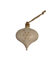 Load image into Gallery viewer, How adorable are these little white and gold metal bells.  They even jingle!  They pair beautifully with our large gold metal hearts for a stunning tree decor.   Perfect for adding a special touch to your holiday gifts.  2 styles to choose from:  Snowflake Design Stars &amp; Dot Design Size:  2 x 2&quot;  Material:  Metal.  Shown:  Snowflake Design Ornament
