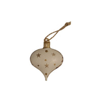 Load image into Gallery viewer, How adorable are these little white and gold metal bells.  They even jingle!  They pair beautifully with our large gold metal hearts for a stunning tree decor.   Perfect for adding a special touch to your holiday gifts.  2 styles to choose from:  Snowflake Design Stars &amp; Dot Design Size:  2 x 2&quot;  Material:  Metal.  Shown:  Stars &amp; Dots Ornament
