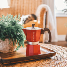 Load image into Gallery viewer, This Milano espresso machine is a beautiful bold red and is made from food safe aluminium with a heat resistant mahogany dip handle and knob, and a non-toxic silicon gasket seal. Medium-fine coffee grounds should be used with the espresso pot.

