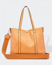 Load image into Gallery viewer, The Nutmeg Nevada Bag is a great tote style which can double as a laptop or work bag. Featuring a luxurious suedette lining, this shoulder bag is spacious and functional with enough room to carry all your essentials and more!  Features:  2 Slip Pockets 1 Zip Pocket Feet on Base Internal Lining: Suedette Strap: Height 25cm Extension Strap: Detachable Webbing 41cm  Magnetic Clasp Material: Vegan Leather  Hardware: Light Gold  Dimensions: H31 x W41 x D11 cm
