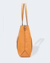 Load image into Gallery viewer, The Nutmeg Nevada Bag is a great tote style which can double as a laptop or work bag. Featuring a luxurious suedette lining, this shoulder bag is spacious and functional with enough room to carry all your essentials and more! Features: 2 Slip Pockets 1 Zip Pocket Feet on Base Internal Lining: Suedette Strap: Height 25cm Extension Strap: Detachable Webbing 41cm Magnetic Clasp Material: Vegan Leather Hardware: Light Gold Dimensions: H31 x W41 x D11 cm
