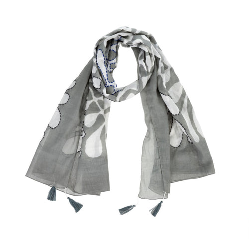 Stylish with a beautiful hand-printed design, using carved wooden blocks and vegetable dyes.  The whimsical stitch and tassels make this a fun accessory for your day trips, errands or a night out.   Materials: 100% Cotton Dimensions: 70