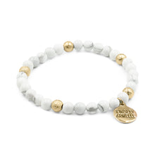 Load image into Gallery viewer, The Pepper Keystone Beaded Bracelet is an absolute no-brainer when creating the perfect stack. It is featured as part of the Lennox Stack. The stone color on this bracelet is sure to grab attention, but subtle enough to wear with any outfit! Exclusively from Kinsley Armelle.  Details:  Style: Beaded Material: White Howlite and Metal Size: 6.5 - 8 Inch Circumference
