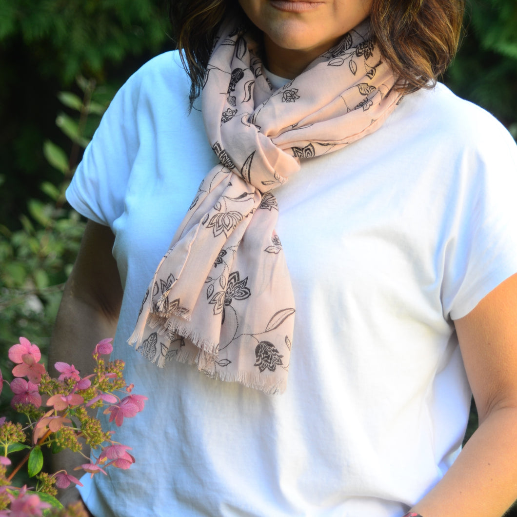Scarves are an important accessory and a definite must have in any wardrobe.  Our beautiful Oversized Floral Scarf is perfect for any day of the year and will add a pop of colour to that wardrobe. This super soft, comfortable and feminine blush and black floral scarf is also elegant for evenings out.  81