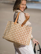 Load image into Gallery viewer, The Simpson Beach Bag is a summer essential for daytime trips or holiday adventures. Finished with a stylish coated jute exterior. This summer beach tote is a must have to venture off to the cottage, boat cruise, picnic or weekend getaway in style this summer! Features: 1 Zip Hanging Wallet Pocket Internal Lining: Coated Jute Strap: Short Strap Height 16cm Strap: Long Strap Height 31cm Material: Coated Jute Hardware: Gunmetal Dimensions: W51 x H33 x D15 cm
