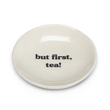 Load image into Gallery viewer, Get your priorities in order with the help of this “But First, Tea” Small Plate. Crafted out of stoneware with a glossy ivory finish, this plate is the perfect size for tea bags or your favourite tea-time treats.   Pair it with any of our tea sets for a perfect gift.  Size:  3.5&quot; D  Material:  Stoneware  Colour:  Ivory
