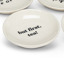 Load image into Gallery viewer, Get your priorities in order with the help of this “But First, Tea” Small Plate. Crafted out of stoneware with a glossy ivory finish, this plate is the perfect size for tea bags or your favourite tea-time treats.   Pair it with any of our tea sets for a perfect gift.  Size:  3.5&quot; D  Material:  Stoneware  Colour:  Ivory
