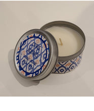 Load image into Gallery viewer, These Travel Candles are great to add to any gift.  Compact and safe in their metal tins, they can be placed anywhere in the home, or bring them on your travels for added comfort.  Their beautiful scents make them the perfect bathroom and kitchen accessory.  4 Scents to choose from:  Amber Sandalwood Citrus Cotton Blossom Frosted Cookie Size:  2.5&quot; d x 2&quot; h  2.5oz. Shown: Citrus 
