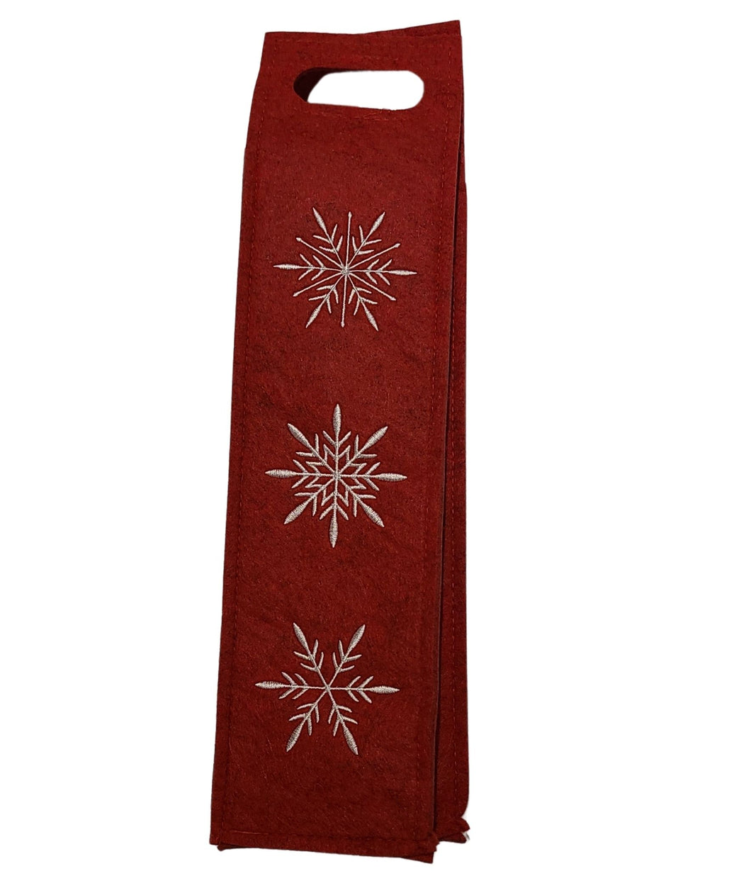 Bring wine and holiday cheer anywhere with this whymsical White Snowflakes Wine Bag. Crafted out of polyester felt, this red wine bag features embroidered white snowflakes— a fun way to take your favourite vintage to-go for the holidays.  Makes a great hostess gift.  Size:  16