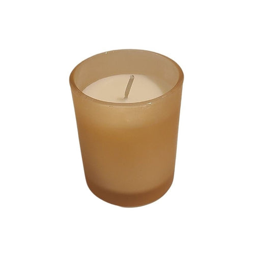 This simple yet elegant Light Orange Frosted Glass Votive Style Candle is hand-poured and infused with Essential Oils for a beautiful fragrance.  With a fresh scent of Vanilla. Perfect to add to any gift.  3