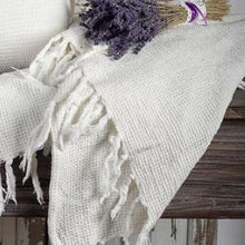 Load image into Gallery viewer, This beautiful Throw Blanket has a classic waffle weave pattern adorned with whimsical fringes.  Light, yet cozy.  Matches perfect with any decor.  Size:  68 × 52 in  Colour:  White  Material:  Cotton
