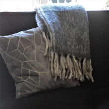 Load image into Gallery viewer, Wrap yourself in soft warmth with this grey throw with long white fringe. Perfect for those chilly mornings and evenings.  Size:  60 × 50 in  Material:  Wool/Acrylic/Polyester
