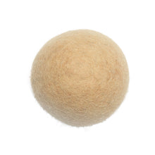 Load image into Gallery viewer, Change your laundry forever with this multi-colour set of reusable dryer balls. Ethically-made and eco-friendly, these alpaca dryer balls are a natural and sustainable alternative to your never-ending supply of dryer sheets. The balls absorb moisture and create air circulation in the dryer. This wind effect in the dryer reduces dryer time. At the same time, the balls replace disposable dryer sheets and plastic dryer balls along with the harsh chemicals within them. Shown: Natural

