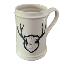 Load image into Gallery viewer, Add to your drinkware collection with these unique beige ceramic beer steins.  Perfect for entertaining on the patio or cottage deck, or chilling in front of the tv.  Pair them with your favourite bottle for a great Father&#39;s Day, Birthday or Just Because gift.  3 styles to choose from.  Antlers. Capacity:  18oz  Material:  Ceramic
