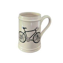 Load image into Gallery viewer, Add to your drinkware collection with these unique beige ceramic beer steins.  Perfect for entertaining on the patio or cottage deck, or chilling in front of the tv.  Pair them with your favourite bottle for a great Father&#39;s Day, Birthday or Just Because gift.  3 styles to choose from:. Bicycle Capacity:  18oz  Material:  Ceramic

