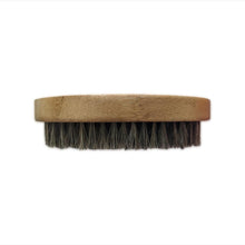 Load image into Gallery viewer, Made of bamboo and boar bristles the dry skin Body Brush is an indispensable tool for skin care. A perfect way to energize and add oxygen to your daily routine. Optimize absorption and effectiveness of all your skin products. To be used on dry skin before a shower in circular motions from the feet upward to the heart on the concerned areas.
