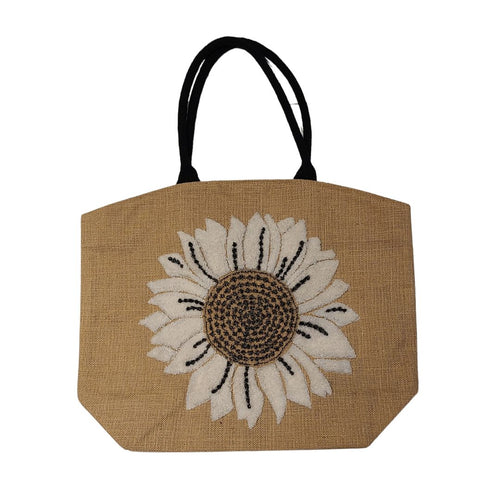 Make a statement this summer on daytime trips or holiday adventures with our beautiful burlap beach tote.  This spacious bag has ample room for all of your essentials.  Styled with hand-woven terrycloth sunflower motifs, this beach bag provides functionality while serving a fashionable look to passers by.  This summer beach tote is a must have to venture off to the beach, cottage, boat cruise, picnic or weekend getaway in style!  Material: Burlap  Dimensions: W21