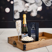 Load image into Gallery viewer, Pop The Champagne Infused Gourmet Popcorn (40 gram bag) by EATABLE.  Kettle popped whole grain popcorn coated in a smooth, premium Belgian white chocolate. Sprinkled with Champagne-infused sugar crystals that literally &quot;pop&quot; in your mouth for an unforgettable sensory-filled snacking experience!  Makes a great addition to any gift set creation.  Also a perfect travel size for a quick car or plane snack on the go.  **Due to the nature of the product, this item is NON-REFUNDABLE
