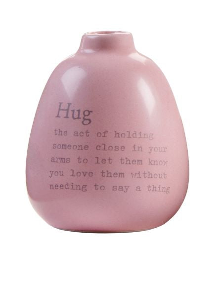 HUG - The act of holding someone close in your arms to let them know you love them without needing to say a thing.  This mini bud vase says it all!  Show them how much you love them.  Dimensions: 4