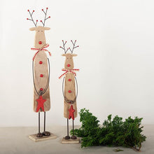 Load image into Gallery viewer, We are in love with these classic wood standing reindeer set, with its gorgeous red accents.  Perfect for any mantel, foyer or table.  Makes a great Teacher or hostess gift.  Set Includes:  (1) Small Reindeer: 12.99 x 2.75 x 1.77&quot; (1) Medium Reindeer: 16.93 x 3.35 x 2.17&quot;
