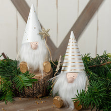 Load image into Gallery viewer, These guy can create magic! Make your holiday decor sparkle and shine with these adorable gold and white metal vintage style santa gnomes. 2 Styles to choose from: Star Santa Gnome Tree Santa Gnome Makes a great Teacher, hostess, or stocking stuffer gift. Size: 4 × 3.5 × 7&quot; each
