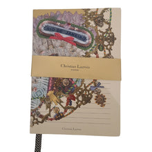 Load image into Gallery viewer, Made for notes-on-the-go. Beautifully detailed artwork by artist Christian Lacroix both outside and inside the jourrnals.  These gilded gold edged journals are great for recipes, to-do lists, work details, or just doodles and daily thoughts, complete with striped ribbon marker for 128 lined pages.  Perfect as a gift for yourself or someone who loves to put their thoughts to paper.    3 Styles to choose from. Mascerade Dimensions:  8&quot; H x 6&quot; W 
