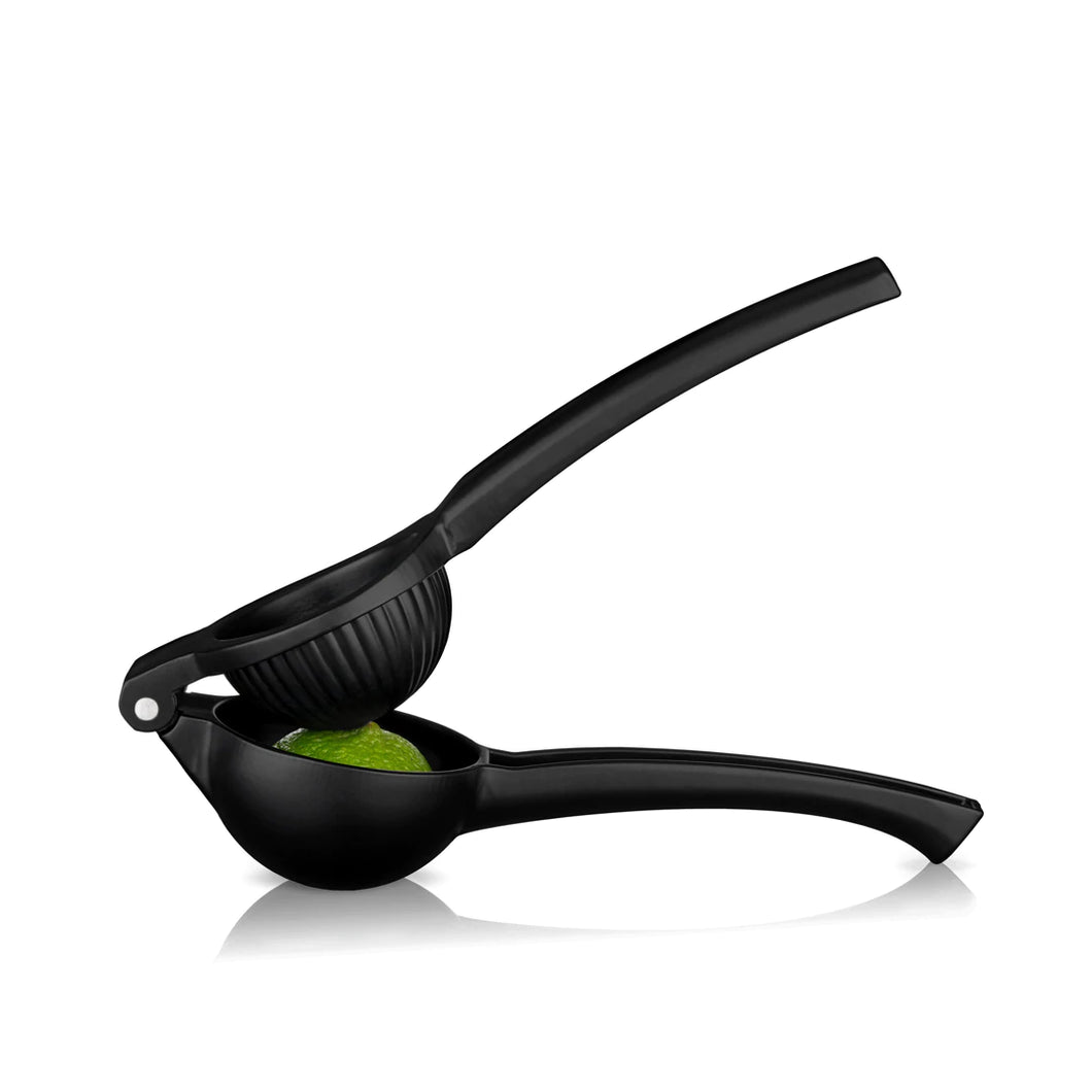 Matte Black Citrus Press by Viski for lemons and limes.  Showing lime inside.