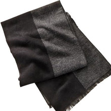 Load image into Gallery viewer, Soft and sophisticated, this sleek accessory, in a blended yarn creates a cozy soft fabric to pair with your winter attire.  This grey and black patterned scarf is finished with a frayed hem.  Materials: 60% Viscose, 40% Polyester
