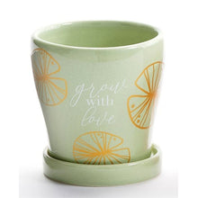 Load image into Gallery viewer, Take your potted plants to the next level with this mini planter styled with an inspirational sentiment and gold accents.  Stunning colours to accent your home decor.  Add a beautiful succulent plant to make a great gift!  Complete with drainage hole and removable tray.  Perfect for Mother&#39;s Day, Birthdays, House Warming or Just Because.  Available in 3 designs.  Green Lotus Pad/GROW WITH LOVE   Size:  3&quot; D  Material:  Ceramic

